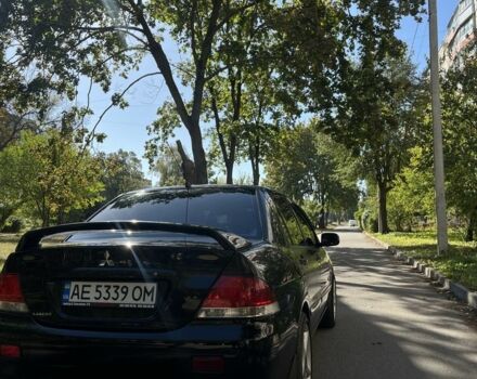 Черный Мицубиси Лансер, объемом двигателя 1.6 л и пробегом 184 тыс. км за 3700 $, фото 5 на Automoto.ua