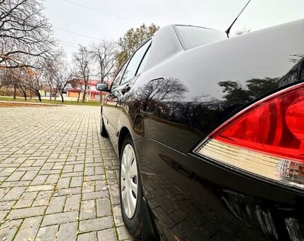 Черный Мицубиси Лансер, объемом двигателя 1.6 л и пробегом 185 тыс. км за 5500 $, фото 4 на Automoto.ua