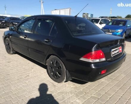 Черный Мицубиси Лансер, объемом двигателя 1.6 л и пробегом 356 тыс. км за 4590 $, фото 12 на Automoto.ua