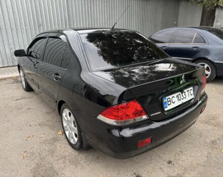 Мицубиси Лансер 2008 в Харькове на Automoto.ua Черный Мицубиси Лансер, объемом двигателя 1.6 л и пробегом 245 тыс. км за 4300 $, фото 3 на Automoto.ua
