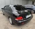 Мицубиси Лансер 2008 в Харькове на Automoto.ua Черный Мицубиси Лансер, объемом двигателя 1.6 л и пробегом 245 тыс. км за 4300 $, фото 3 на Automoto.ua