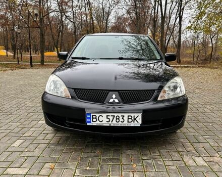 Черный Мицубиси Лансер, объемом двигателя 1.6 л и пробегом 185 тыс. км за 5500 $, фото 2 на Automoto.ua