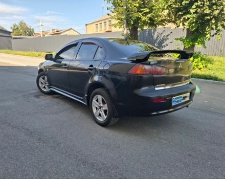 Чорний Міцубісі Lancer, об'ємом двигуна 2 л та пробігом 230 тис. км за 6650 $, фото 6 на Automoto.ua