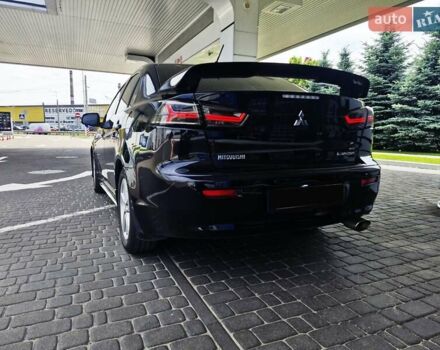 Чорний Міцубісі Lancer, об'ємом двигуна 2 л та пробігом 240 тис. км за 7850 $, фото 8 на Automoto.ua