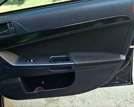 Черный Мицубиси Лансер, объемом двигателя 1.5 л и пробегом 205 тыс. км за 6300 $, фото 18 на Automoto.ua