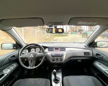 Черный Мицубиси Лансер, объемом двигателя 1.6 л и пробегом 240 тыс. км за 4200 $, фото 2 на Automoto.ua