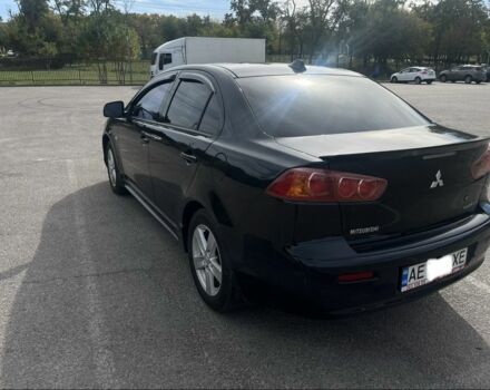 Чорний Міцубісі Lancer, об'ємом двигуна 2 л та пробігом 221 тис. км за 6300 $, фото 4 на Automoto.ua
