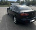 Чорний Міцубісі Lancer, об'ємом двигуна 2 л та пробігом 221 тис. км за 6300 $, фото 4 на Automoto.ua