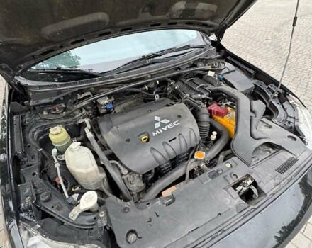 Чорний Міцубісі Lancer, об'ємом двигуна 2 л та пробігом 200 тис. км за 6800 $, фото 9 на Automoto.ua