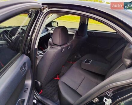 Чорний Міцубісі Lancer, об'ємом двигуна 2 л та пробігом 175 тис. км за 7800 $, фото 11 на Automoto.ua