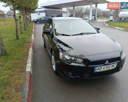 Черный Мицубиси Лансер, объемом двигателя 2 л и пробегом 200 тыс. км за 5100 $, фото 18 на Automoto.ua