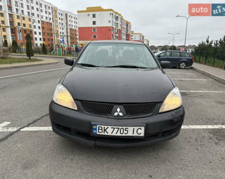Чорний Міцубісі Lancer, об'ємом двигуна 1.58 л та пробігом 388 тис. км за 2300 $, фото 2 на Automoto.ua
