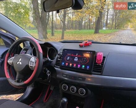 Чорний Міцубісі Lancer, об'ємом двигуна 2 л та пробігом 237 тис. км за 7500 $, фото 21 на Automoto.ua