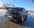 Черный Мицубиси Лансер, объемом двигателя 2 л и пробегом 270 тыс. км за 5650 $, фото 1 на Automoto.ua