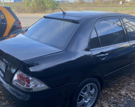 Мицубиси Лансер 2008 в Киеве на Automoto.ua Черный Мицубиси Лансер, объемом двигателя 1.6 л и пробегом 72 тыс. км за 2650 $, фото 6 на Automoto.ua