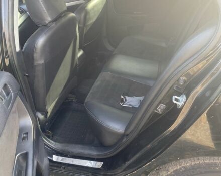 Черный Мицубиси Лансер, объемом двигателя 2 л и пробегом 190 тыс. км за 3100 $, фото 5 на Automoto.ua