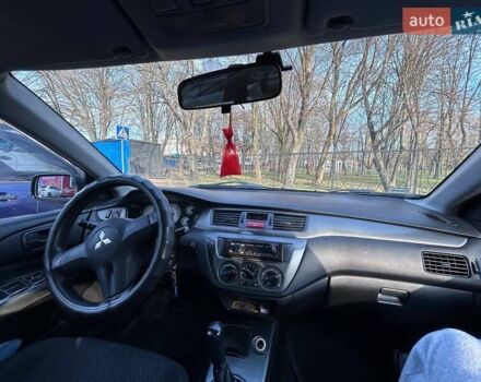 Чорний Міцубісі Lancer, об'ємом двигуна 1.6 л та пробігом 310 тис. км за 3500 $, фото 45 на Automoto.ua
