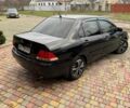 Чорний Міцубісі Lancer, об'ємом двигуна 1.6 л та пробігом 220 тис. км за 3600 $, фото 3 на Automoto.ua