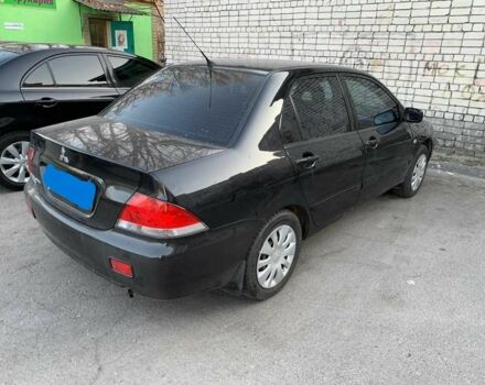 Чорний Міцубісі Lancer, об'ємом двигуна 0 л та пробігом 250 тис. км за 4900 $, фото 1 на Automoto.ua