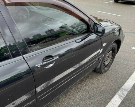 Чорний Міцубісі Lancer, об'ємом двигуна 1.6 л та пробігом 245 тис. км за 4500 $, фото 6 на Automoto.ua