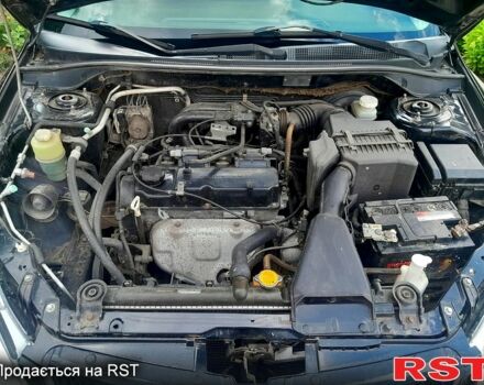 Черный Мицубиси Лансер, объемом двигателя 1.6 л и пробегом 206 тыс. км за 4200 $, фото 4 на Automoto.ua