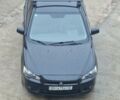 Чорний Міцубісі Lancer, об'ємом двигуна 2 л та пробігом 300 тис. км за 6000 $, фото 6 на Automoto.ua