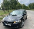Черный Мицубиси Лансер, объемом двигателя 1.5 л и пробегом 220 тыс. км за 5350 $, фото 1 на Automoto.ua