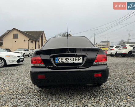 Черный Мицубиси Лансер, объемом двигателя 1.58 л и пробегом 202 тыс. км за 4100 $, фото 17 на Automoto.ua