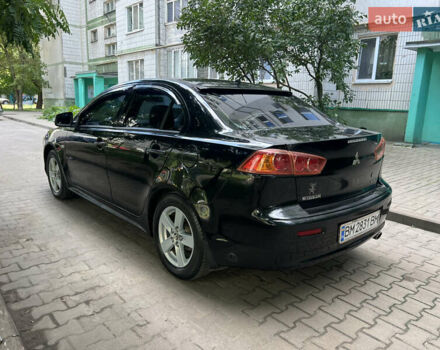 Черный Мицубиси Лансер, объемом двигателя 1.5 л и пробегом 223 тыс. км за 6000 $, фото 9 на Automoto.ua