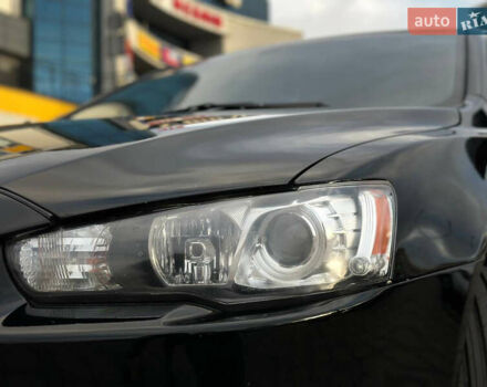 Черный Мицубиси Лансер, объемом двигателя 2 л и пробегом 236 тыс. км за 7950 $, фото 14 на Automoto.ua