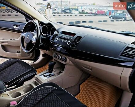 Мицубиси Лансер 2008 в Черкассах на Automoto.ua Черный Мицубиси Лансер, объемом двигателя 2 л и пробегом 178 тыс. км за 7400 $, фото 17 на Automoto.ua
