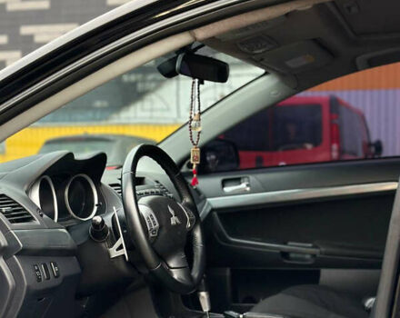 Черный Мицубиси Лансер, объемом двигателя 2 л и пробегом 236 тыс. км за 7950 $, фото 8 на Automoto.ua