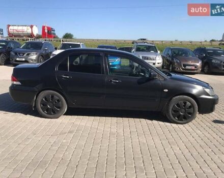 Мицубиси Лансер 2008 в Львове на Automoto.ua Черный Мицубиси Лансер, объемом двигателя 1.6 л и пробегом 356 тыс. км за 4590 $, фото 9 на Automoto.ua