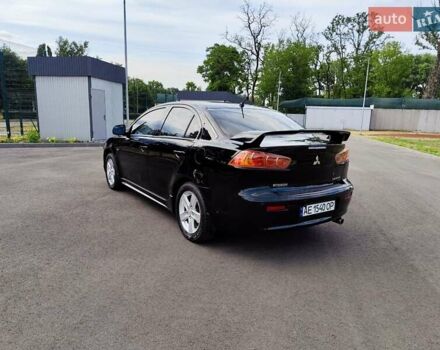 Чорний Міцубісі Lancer, об'ємом двигуна 2 л та пробігом 175 тис. км за 7800 $, фото 9 на Automoto.ua