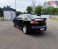 Чорний Міцубісі Lancer, об'ємом двигуна 2 л та пробігом 175 тис. км за 7800 $, фото 9 на Automoto.ua