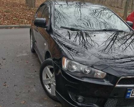 Чорний Міцубісі Lancer, об'ємом двигуна 2 л та пробігом 302 тис. км за 7200 $, фото 6 на Automoto.ua