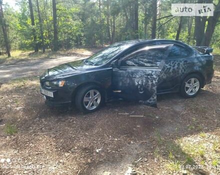 Чорний Міцубісі Lancer, об'ємом двигуна 2 л та пробігом 150 тис. км за 7600 $, фото 1 на Automoto.ua