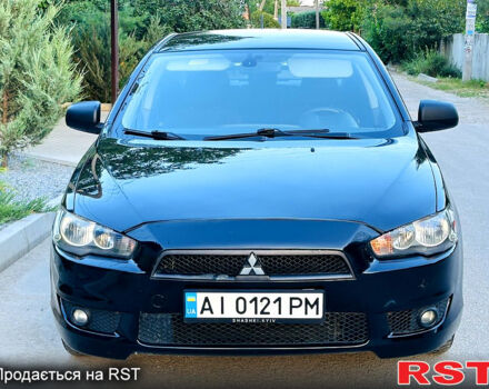 Чорний Міцубісі Lancer, об'ємом двигуна 2 л та пробігом 240 тис. км за 5900 $, фото 1 на Automoto.ua