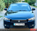 Чорний Міцубісі Lancer, об'ємом двигуна 2 л та пробігом 240 тис. км за 5900 $, фото 1 на Automoto.ua