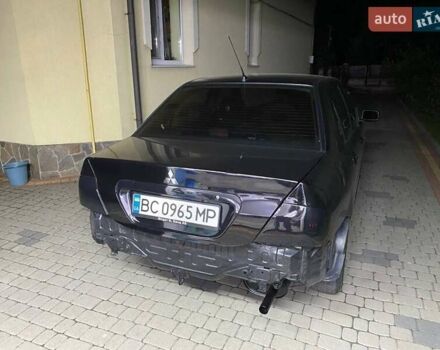 Мицубиси Лансер 2008 в Львове на Automoto.ua Черный Мицубиси Лансер, объемом двигателя 1.58 л и пробегом 200 тыс. км за 5200 $, фото 49 на Automoto.ua