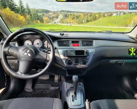 Міцубісі Lancer 2008 у Тернополі на Automoto.ua Чорний Міцубісі Lancer, об'ємом двигуна 1.58 л та пробігом 182 тис. км за 5600 $, фото 17 на Automoto.ua