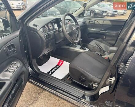 Мицубиси Лансер 2008 в Запорожье на Automoto.ua Черный Мицубиси Лансер, объемом двигателя 1.6 л и пробегом 316 тыс. км за 4290 $, фото 10 на Automoto.ua