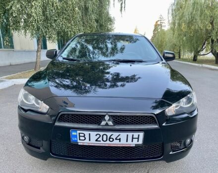 Чорний Міцубісі Lancer, об'ємом двигуна 2 л та пробігом 221 тис. км за 6990 $, фото 13 на Automoto.ua