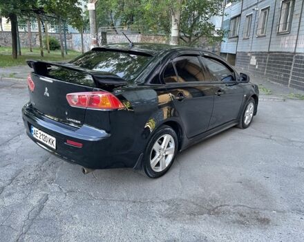 Чорний Міцубісі Lancer, об'ємом двигуна 2 л та пробігом 215 тис. км за 7700 $, фото 3 на Automoto.ua