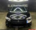 Чорний Міцубісі Lancer, об'ємом двигуна 2 л та пробігом 126 тис. км за 5800 $, фото 1 на Automoto.ua