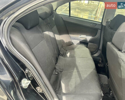 Мицубиси Лансер 2008 в Киеве на Automoto.ua Черный Мицубиси Лансер, объемом двигателя 2 л и пробегом 219 тыс. км за 6500 $, фото 8 на Automoto.ua