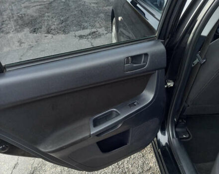 Чорний Міцубісі Lancer, об'ємом двигуна 1.5 л та пробігом 160 тис. км за 5850 $, фото 5 на Automoto.ua