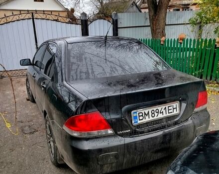 Чорний Міцубісі Lancer, об'ємом двигуна 1.6 л та пробігом 126 тис. км за 4500 $, фото 1 на Automoto.ua