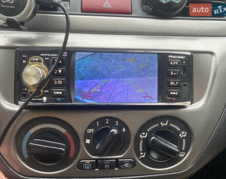 Черный Мицубиси Лансер, объемом двигателя 1.58 л и пробегом 211 тыс. км за 6333 $, фото 32 на Automoto.ua