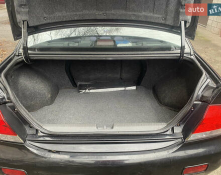 Черный Мицубиси Лансер, объемом двигателя 1.6 л и пробегом 143 тыс. км за 3000 $, фото 12 на Automoto.ua